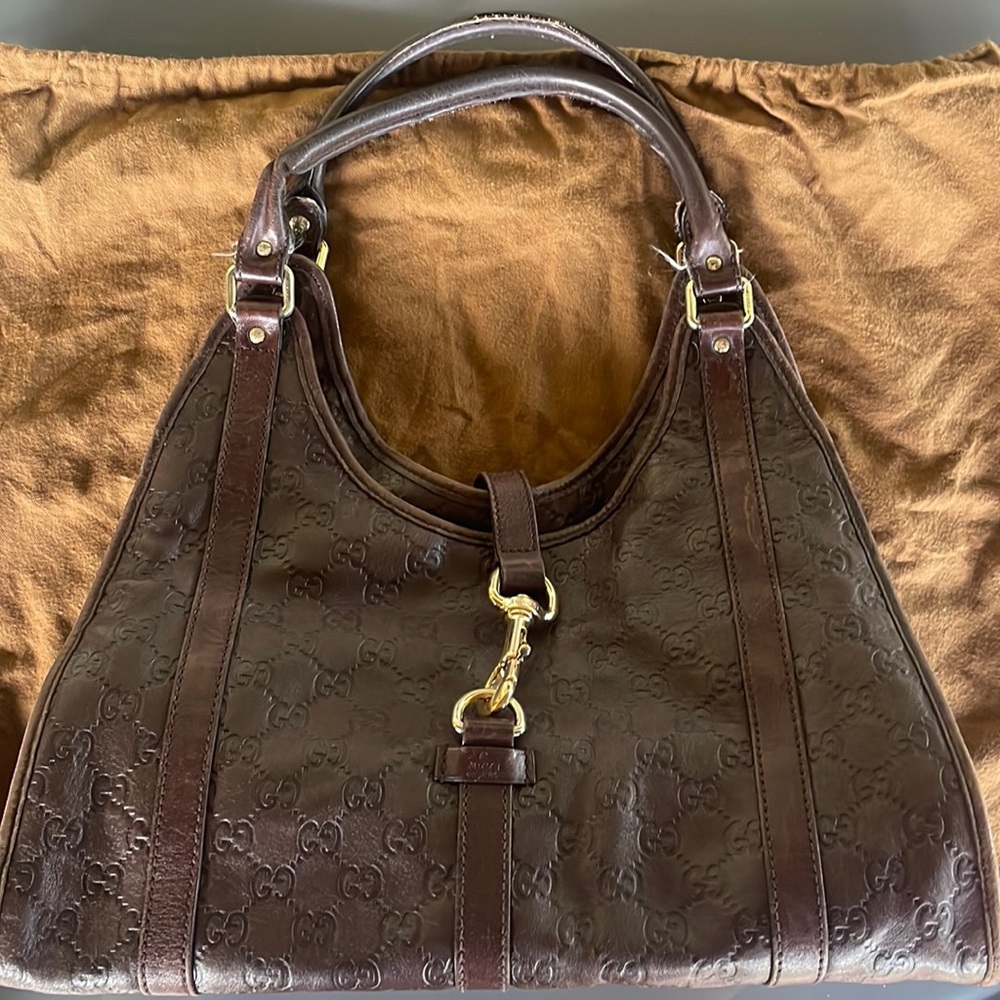 Original brown Gucci bag .